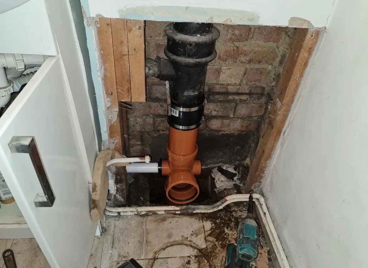 Drainage pipework being installed