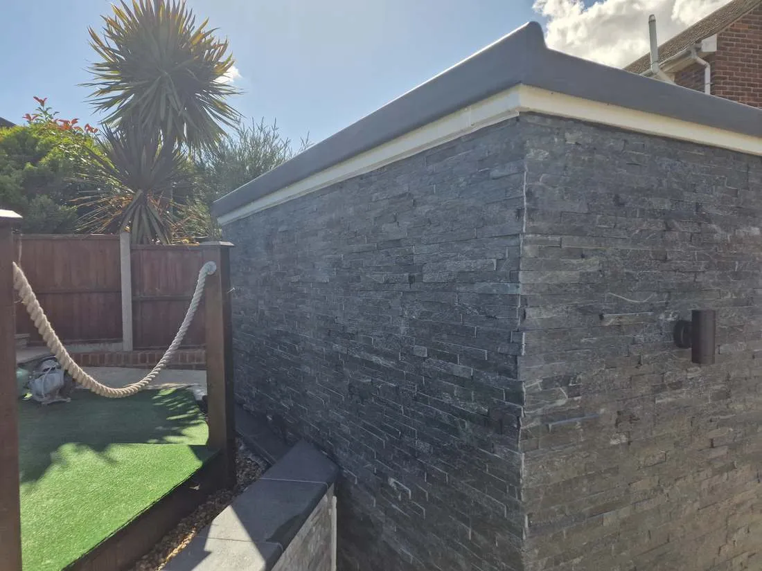 Slate-clad feature wall by DJG Groundworks