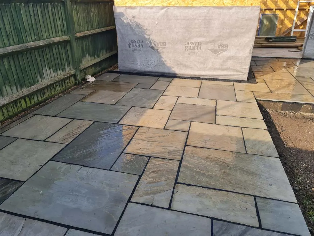 Natural sandstone patio laid in a random pattern by DJG Groundworks