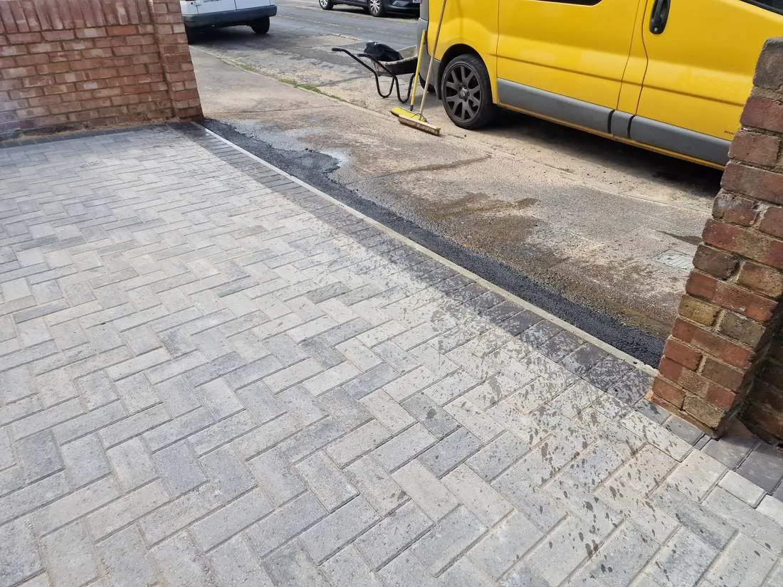 Herringbone block paving with a neat edge by DJG Groundworks