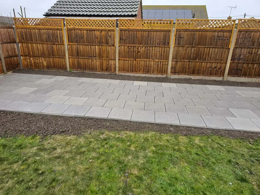 Closeboard fencing with decorative trellis top by DJG Groundworks