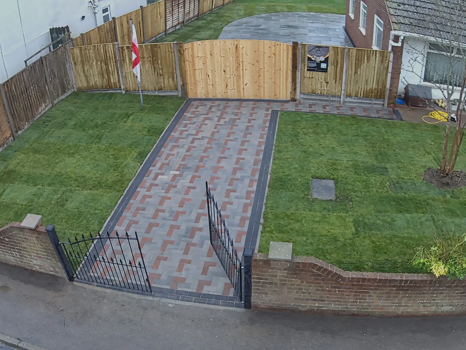 Block paved driveway with a contrasting border